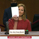 Illustration for article titled Photoshop Contest: Whats Amy Coney Barrett Doodling?